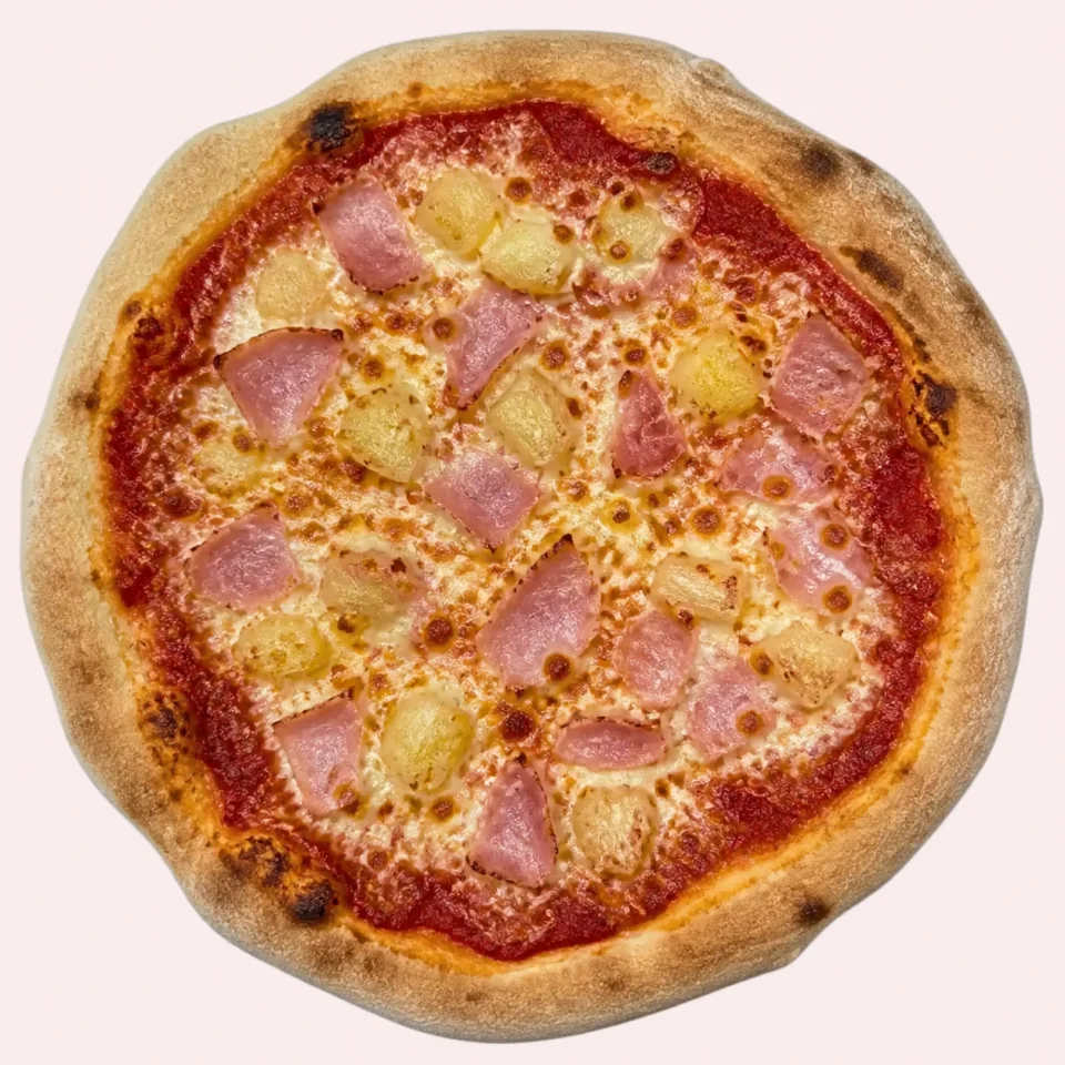Stone-baked turkey ham and pineapple pizza